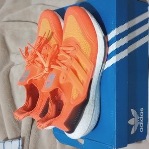 FREE SHIPPING!!!Orange adidas ultra boost 21 gently used. Worn maybe 4 times.